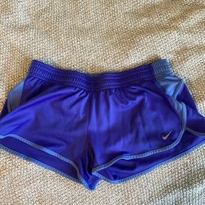 Purple Nike running shorts